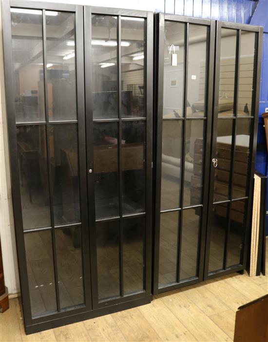 A pair of ebonised glazed bookcases H.193cm